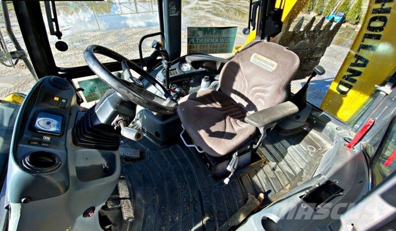 New Holland B 115 Ekskavatori-iekrāvēji