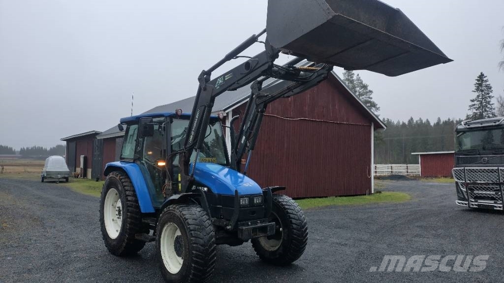 New Holland TL90 trima kuormaaja, sähköinen suunnanvaihtaja Traktorid