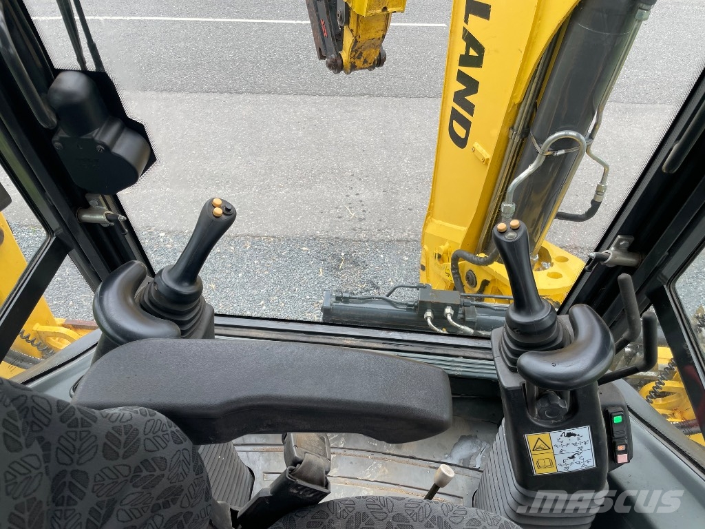 New Holland B115C لوادر ذات جرافات عكسية