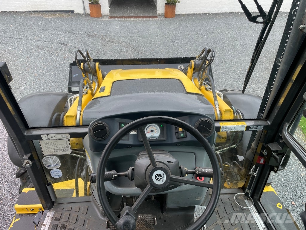 New Holland B115C لوادر ذات جرافات عكسية