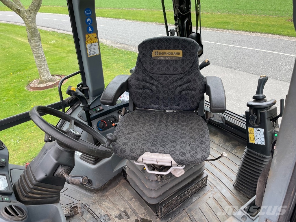 New Holland B115C لوادر ذات جرافات عكسية