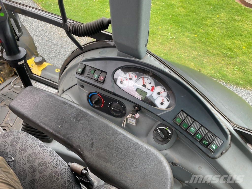 New Holland B115C لوادر ذات جرافات عكسية