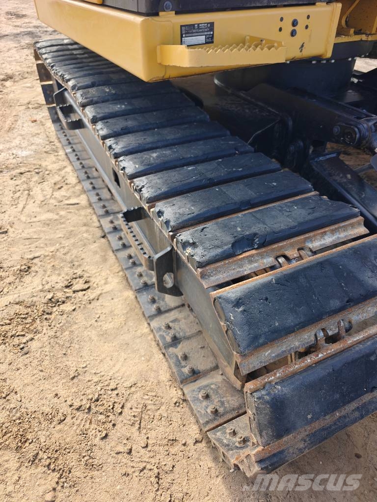 CAT 310 Pásové rýpadlá