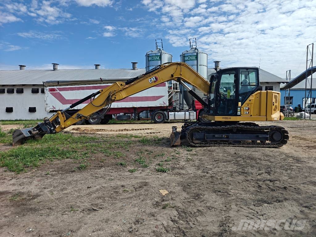 CAT 310 Pásové rýpadlá