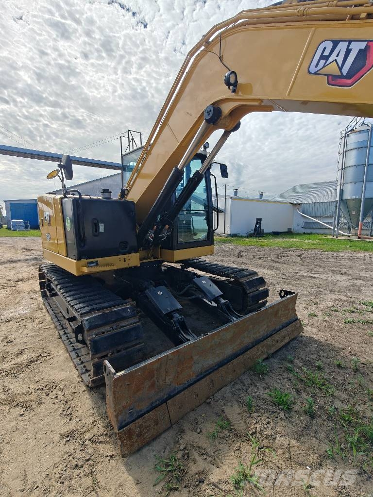 CAT 310 Pásové rýpadlá