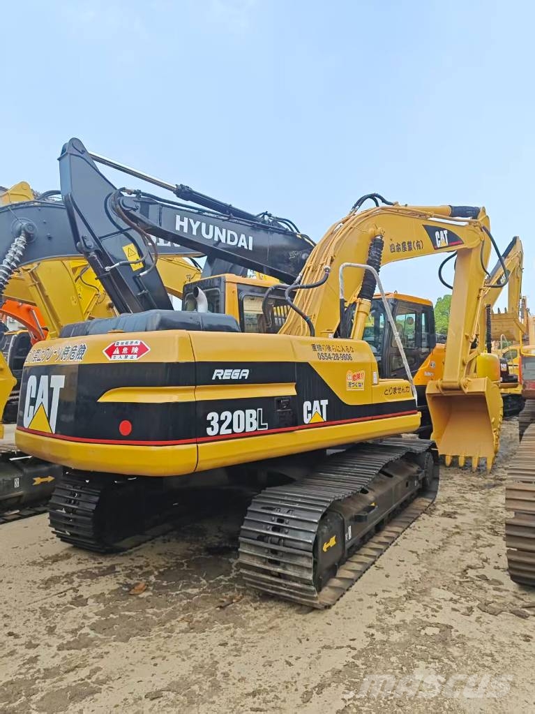 CAT 320BL Гусеничні екскаватори