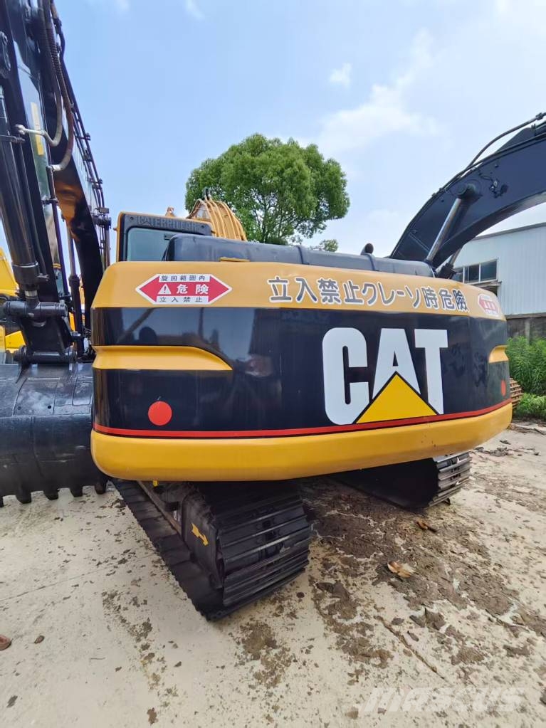 CAT 320BL Гусеничні екскаватори