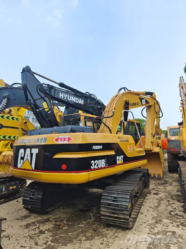 CAT 320BL Гусеничні екскаватори