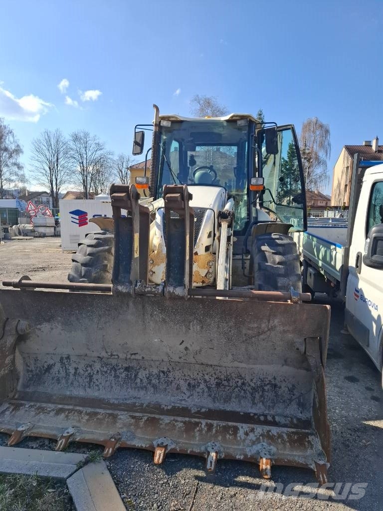 Komatsu WB 97 S-5 لوادر ذات جرافات عكسية