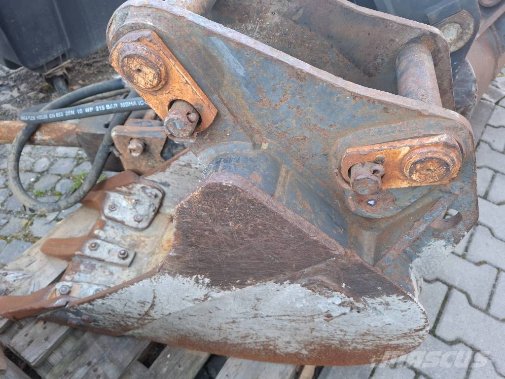 Komatsu WB 97 S-5 لوادر ذات جرافات عكسية