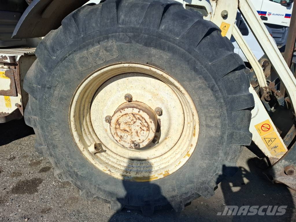 Komatsu WB 97 S-5 لوادر ذات جرافات عكسية