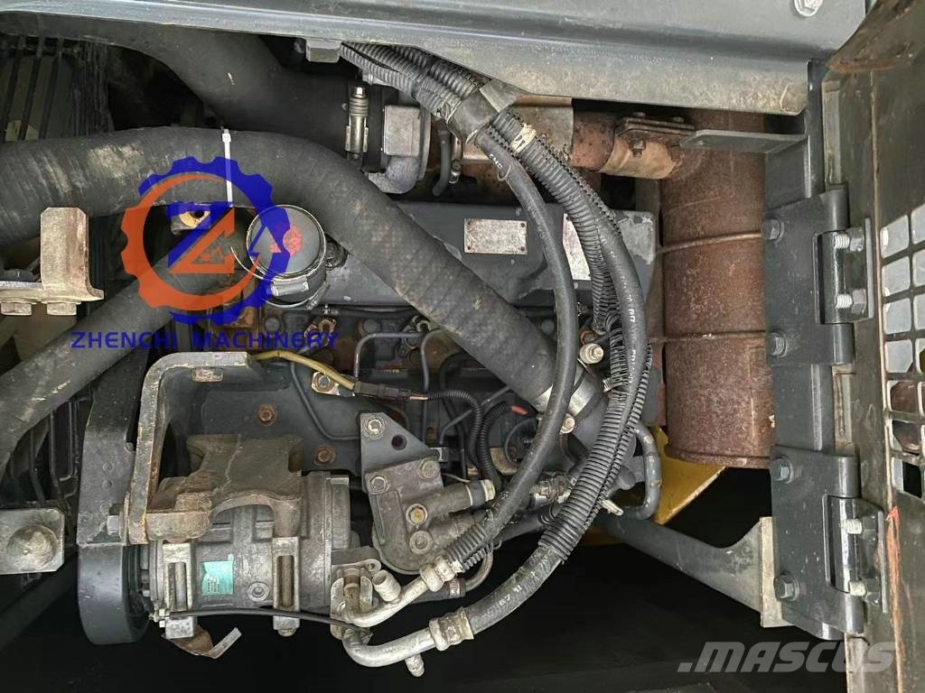 Komatsu PC 128 US حفارات وسط 7 طن - 12 طن