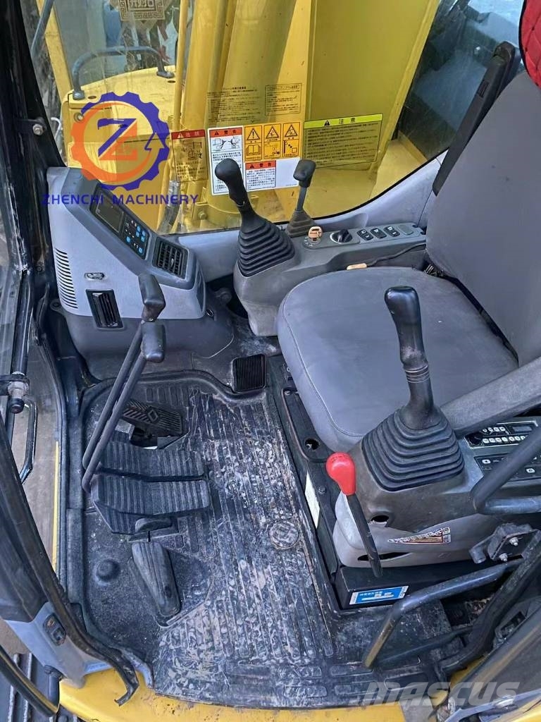 Komatsu PC 128 US حفارات وسط 7 طن - 12 طن