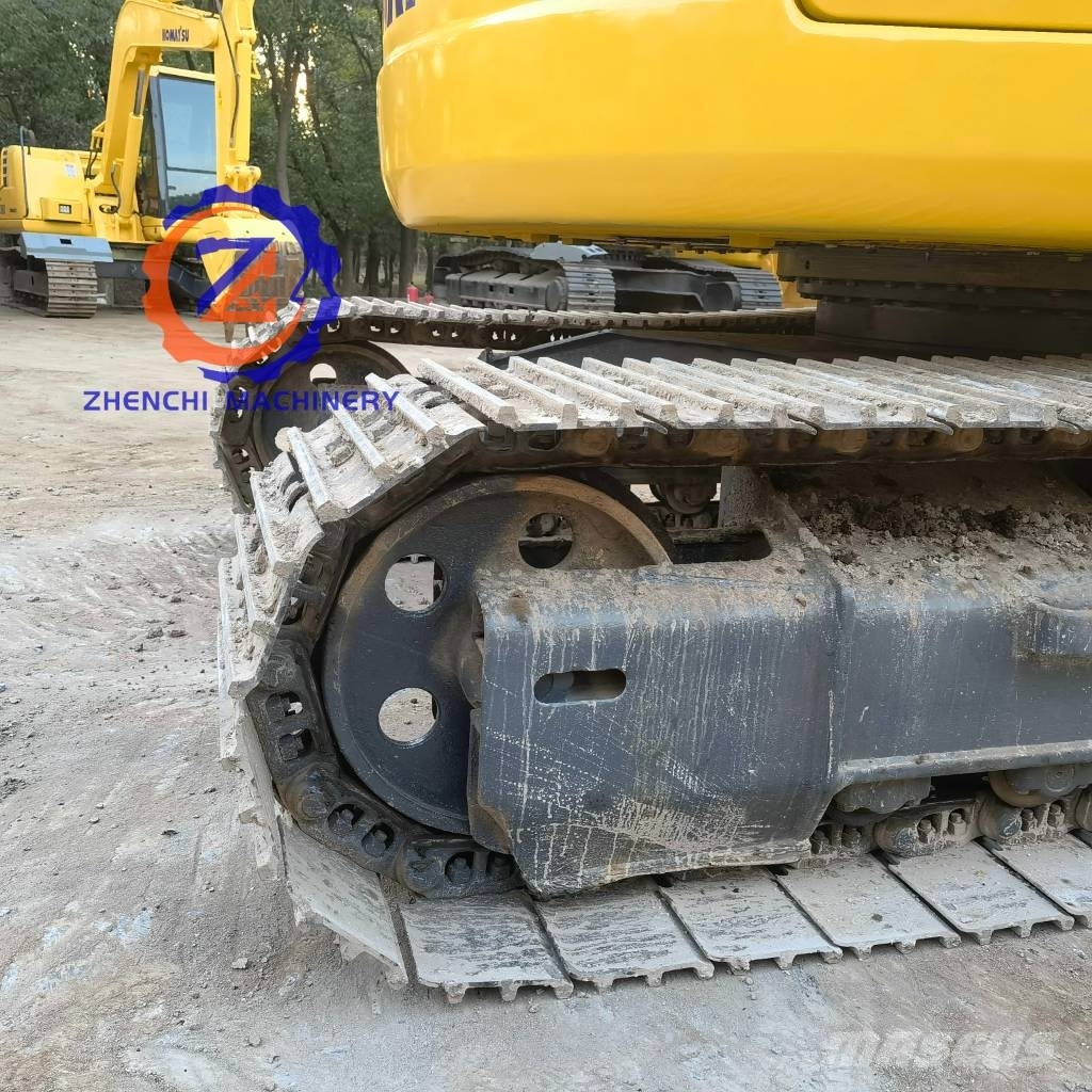 Komatsu PC 128 US حفارات وسط 7 طن - 12 طن