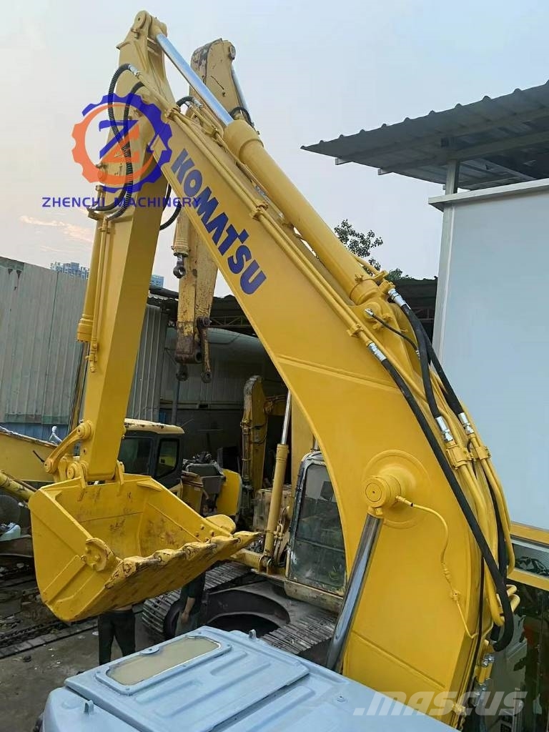 Komatsu PC 128 US حفارات وسط 7 طن - 12 طن