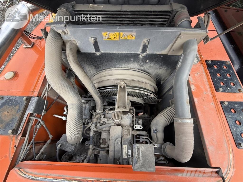 Hitachi ZX 140W-5B حفارات بعجل