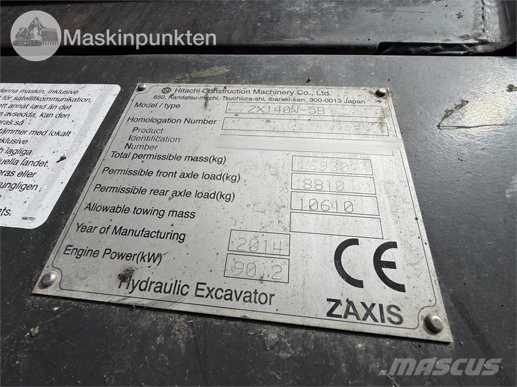Hitachi ZX 140W-5B حفارات بعجل