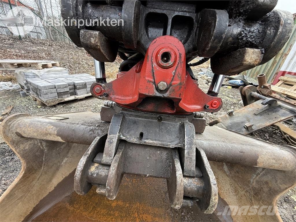 Hitachi ZX 140W-5B حفارات بعجل