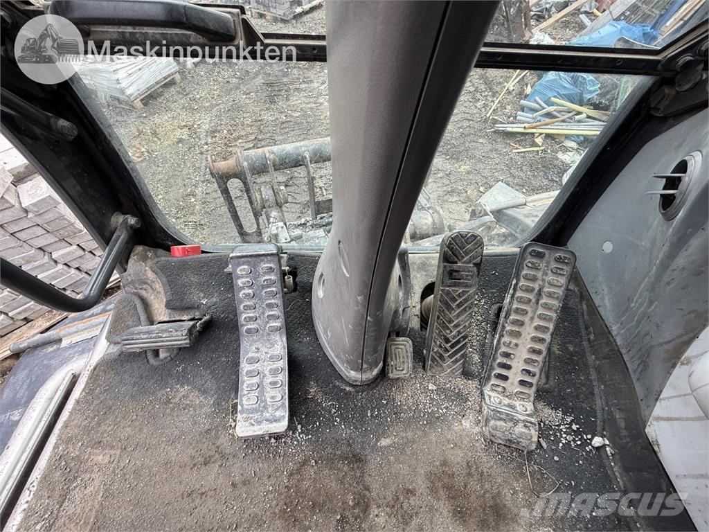 Hitachi ZX 140W-5B حفارات بعجل