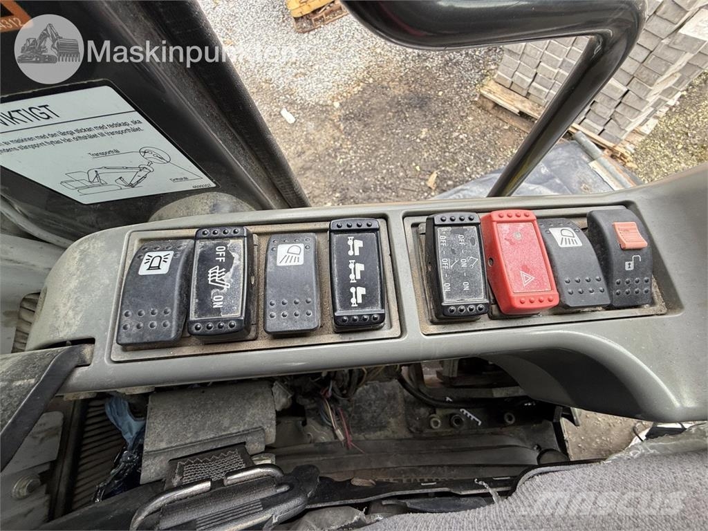 Hitachi ZX 140W-5B حفارات بعجل