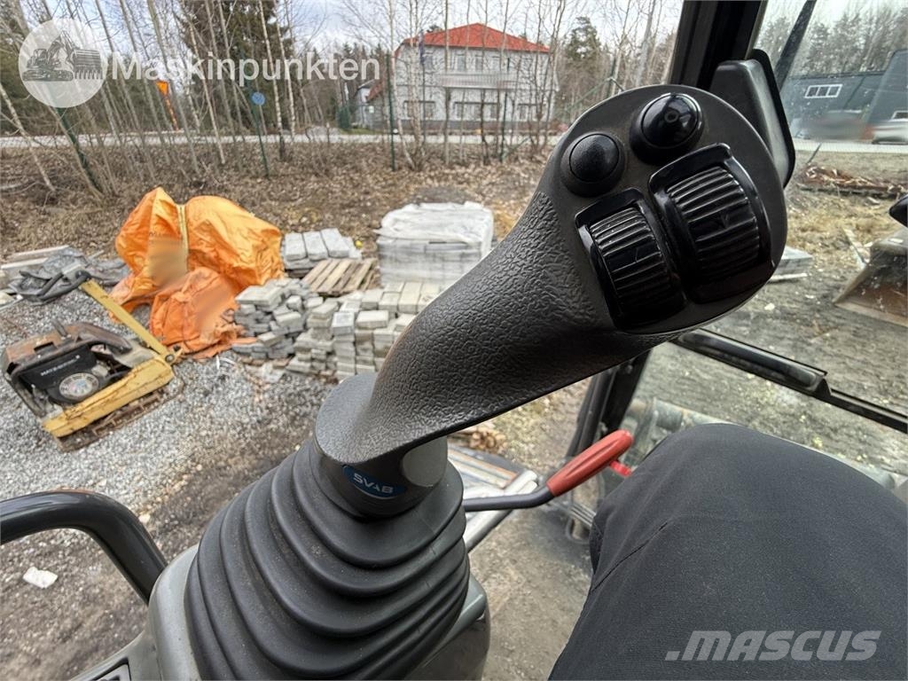Hitachi ZX 140W-5B حفارات بعجل