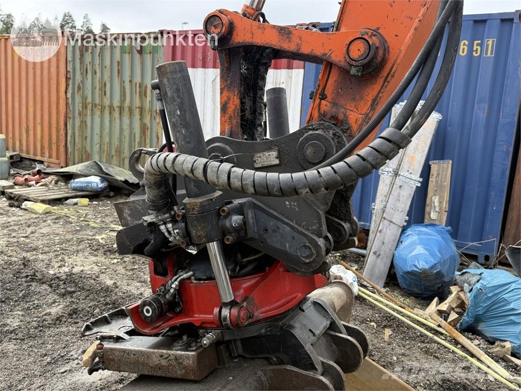 Hitachi ZX 140W-5B حفارات بعجل