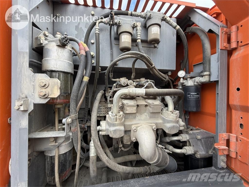 Hitachi ZX 140W-5B حفارات بعجل