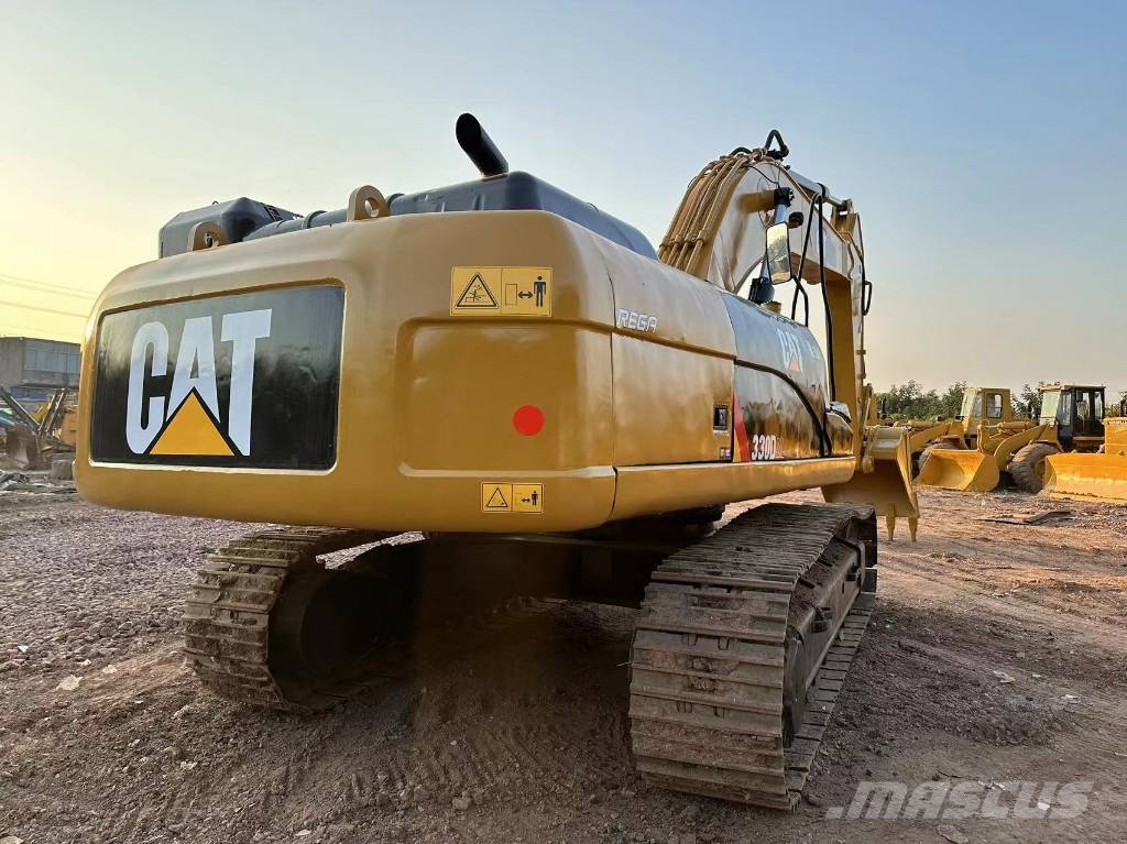 CAT 330DL Гусеничні екскаватори