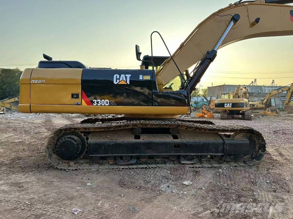 CAT 330DL Гусеничні екскаватори