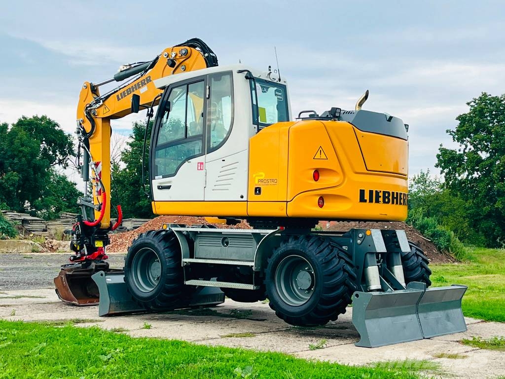 Liebherr A 910 حفارات بعجل