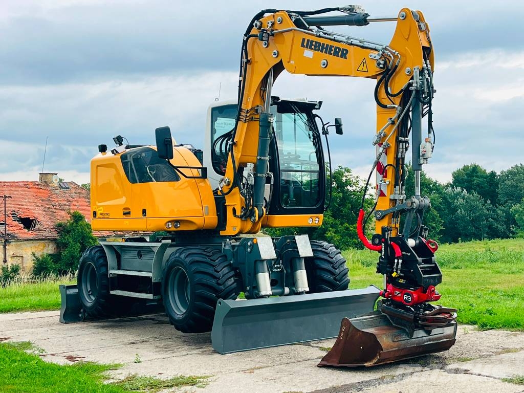 Liebherr A 910 حفارات بعجل