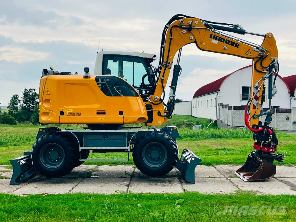 Liebherr A 910 حفارات بعجل
