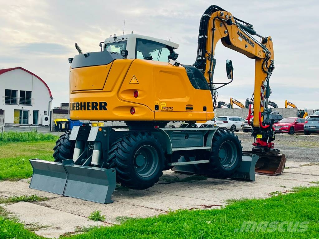 Liebherr A 910 حفارات بعجل