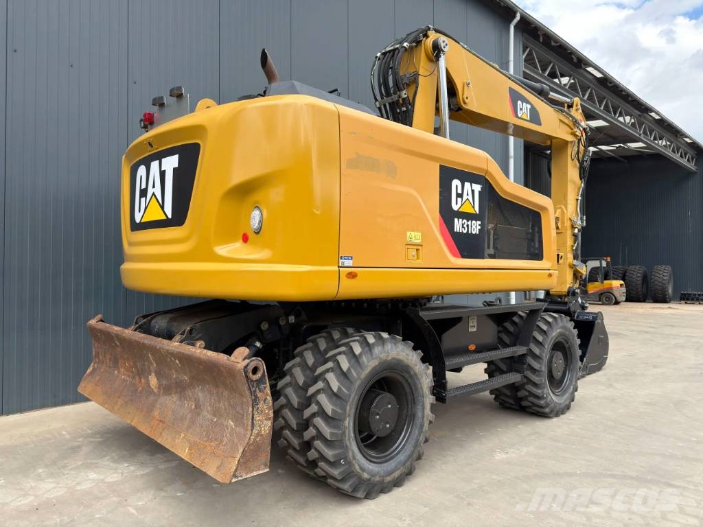 CAT M318F Excavatoare cu roti