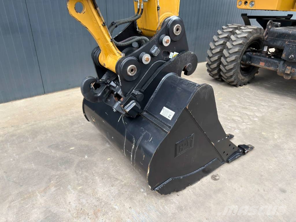 CAT M318F Excavatoare cu roti
