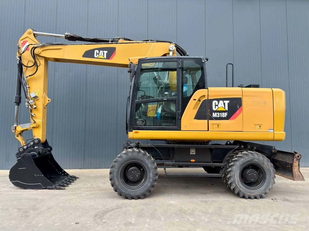 CAT M318F Excavatoare cu roti