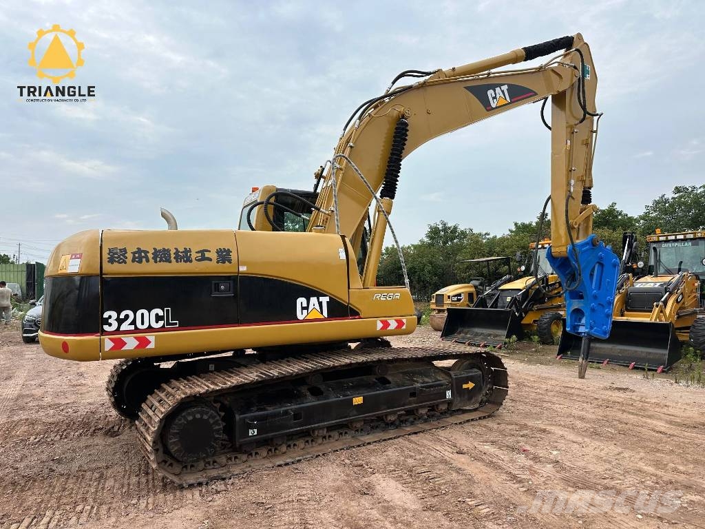 CAT 320 C Гусеничні екскаватори