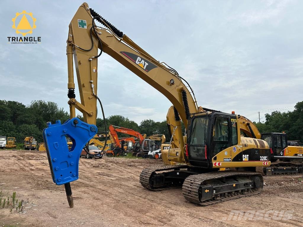 CAT 320 C Гусеничні екскаватори