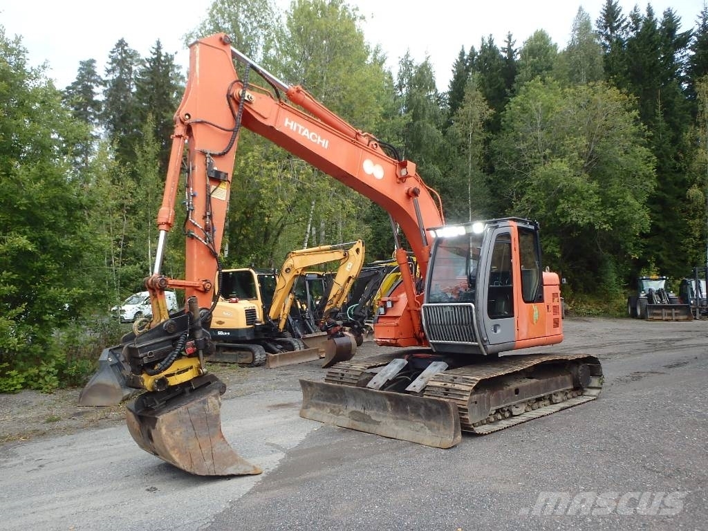  Hitachi ZX 135 US pyörittäjällä, 2003, Forssa, Finland