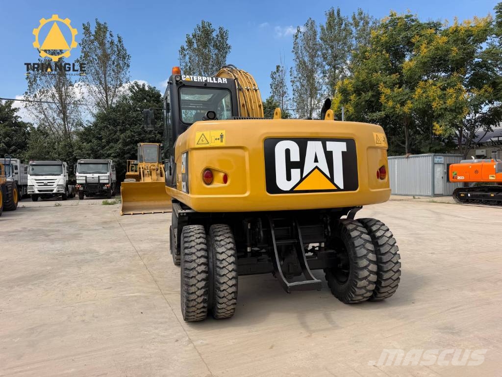 CAT M320DL Ratiniai ekskavatoriai