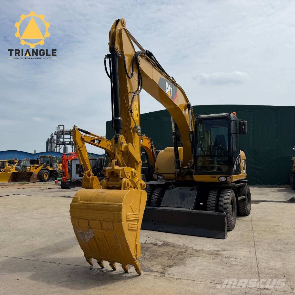 CAT M320DL Ratiniai ekskavatoriai