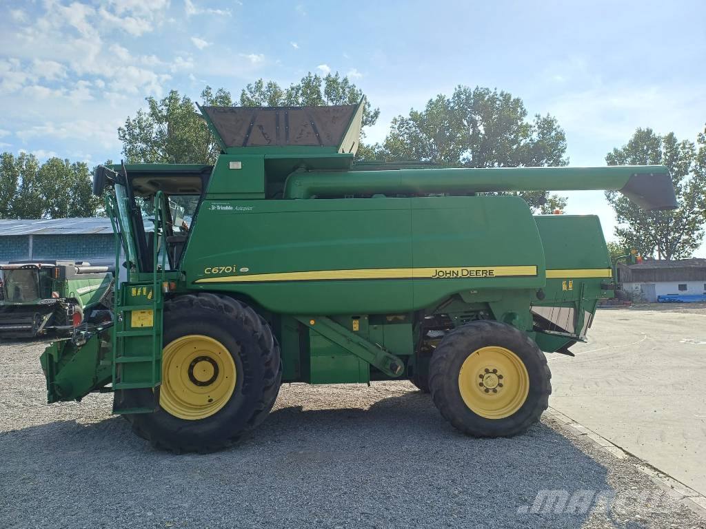 John Deere C 670 i Kombajni