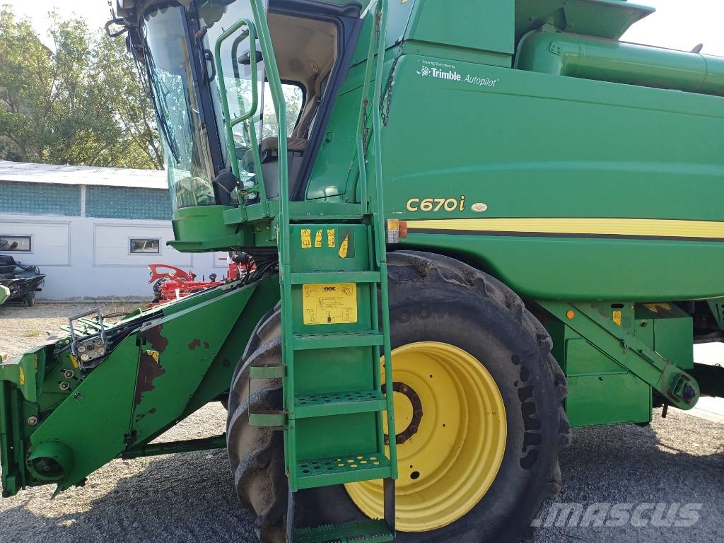 John Deere C 670 i Kombajni