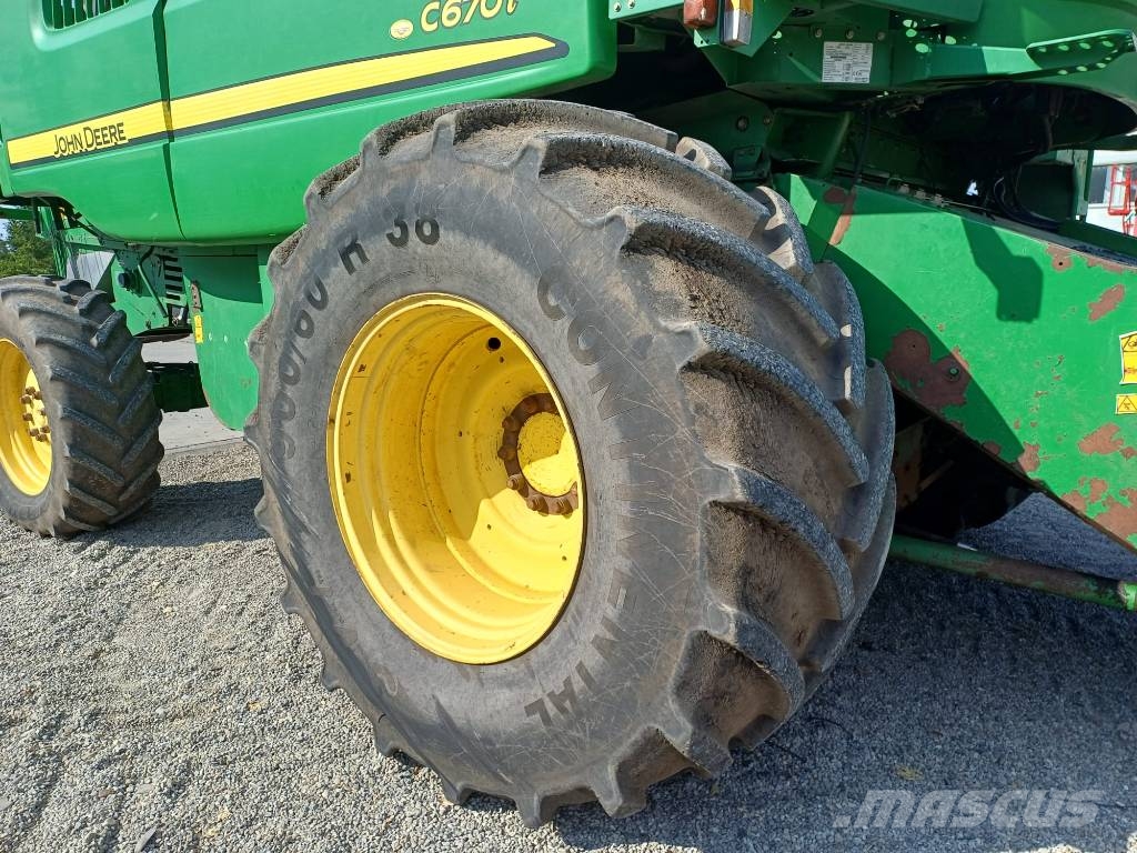 John Deere C 670 i Kombajni