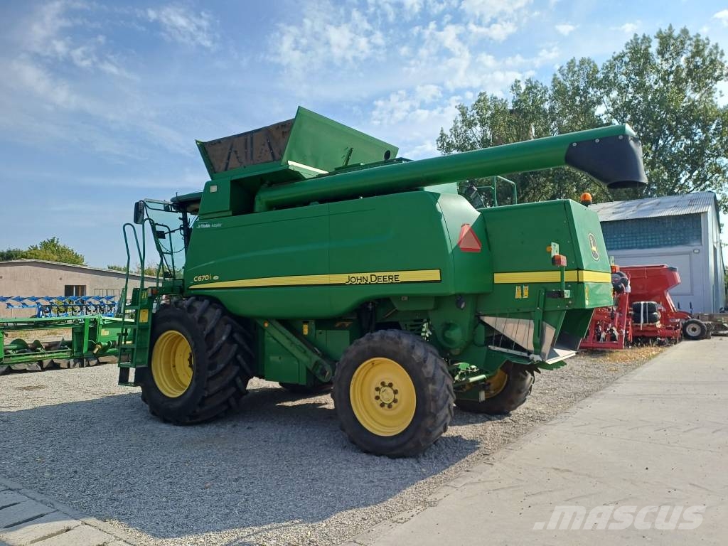 John Deere C 670 i Kombajni