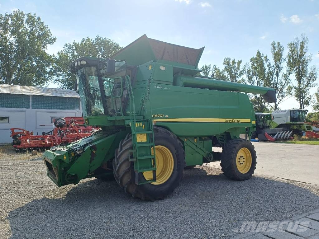 John Deere C 670 i Kombajni