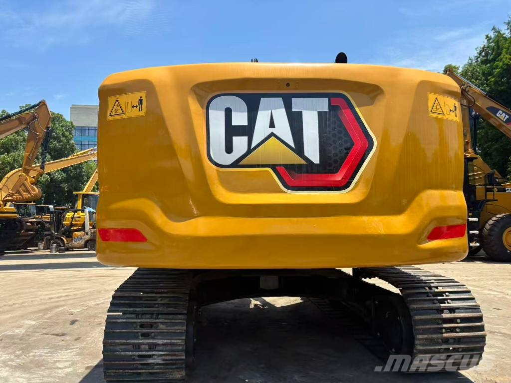 CAT 323 Bagri goseničarji