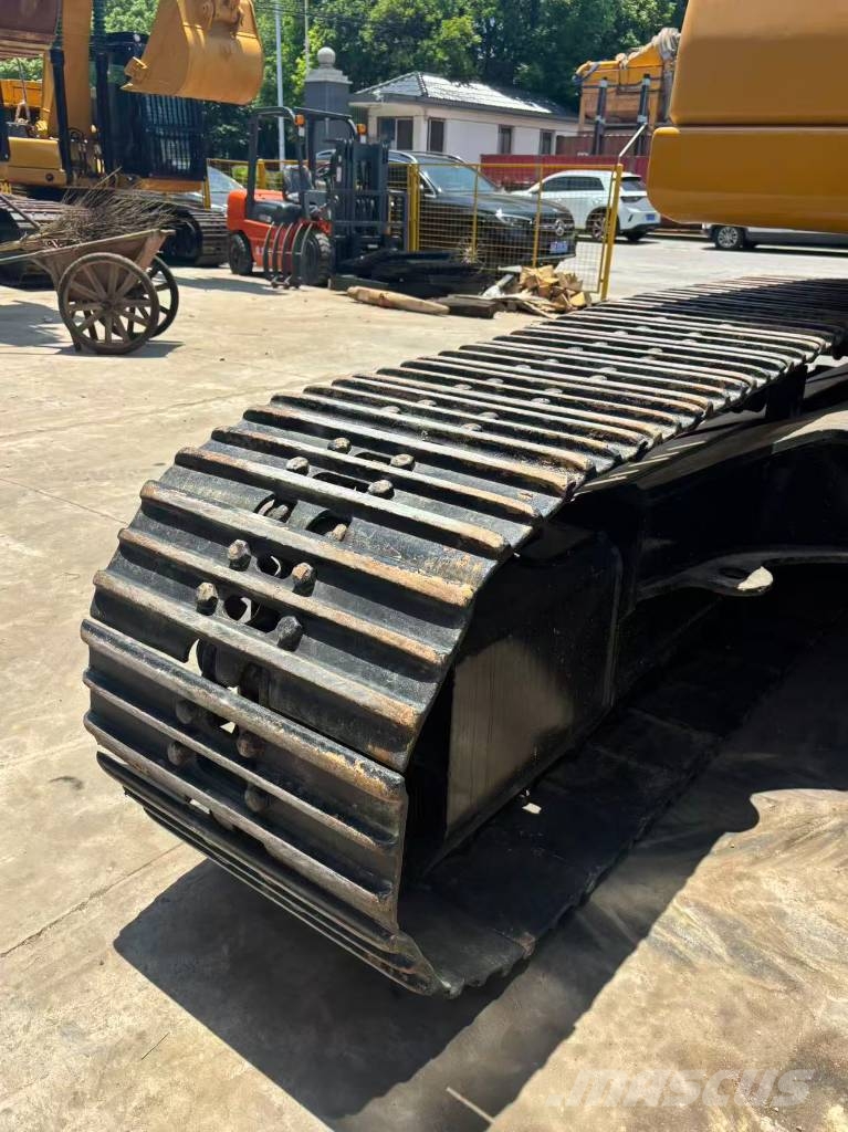 CAT 323 Bagri goseničarji