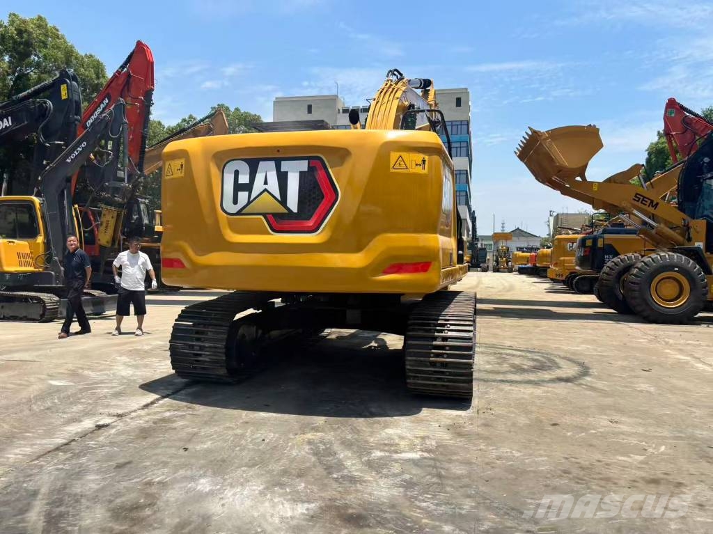 CAT 323 Bagri goseničarji