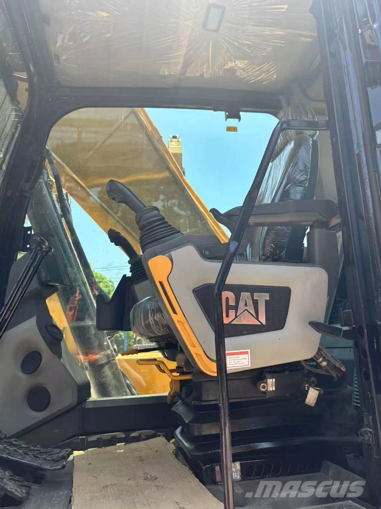 CAT 323 Bagri goseničarji